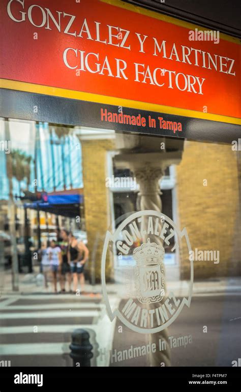 Reflecting Storefront Window For Gonzales And Martinez Cigar Factory