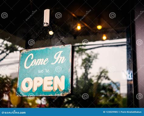 Come in we`re Open Sign on Door of Coffee Shop. Stock Image - Image of hanging, open: 123029985