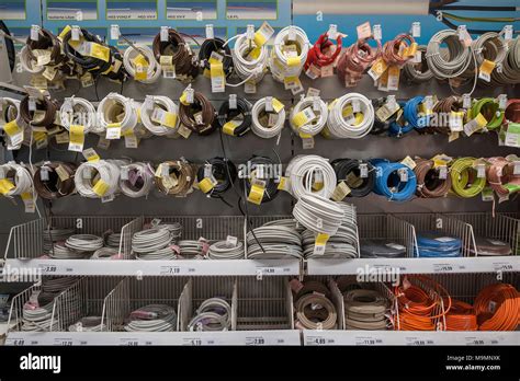 Electrical Supplies Electric Cables Hanging On Shelves Hardware Store