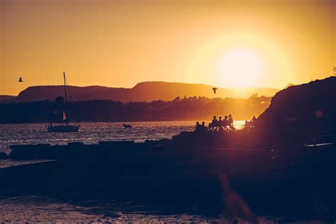 Free Images Sea Coast Water Horizon Person Cloud Sun Sunrise