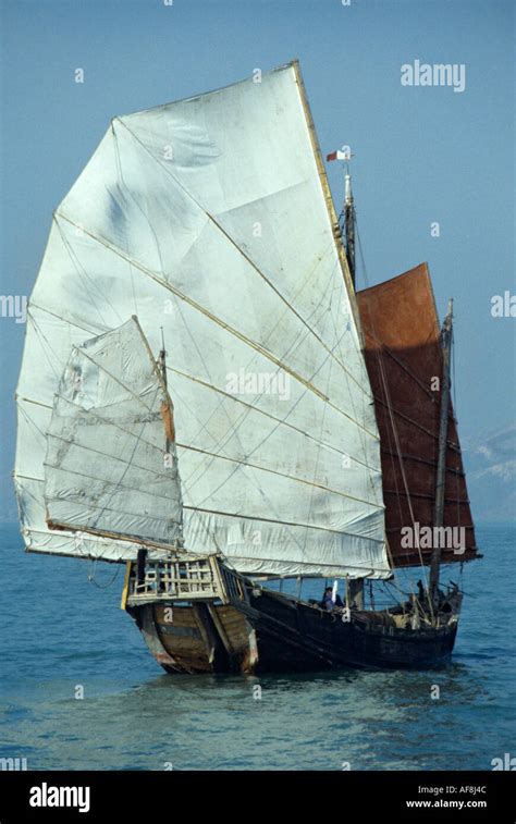 Stern View Of A Traditional Genuine Old Local Sailing Junk In The Late