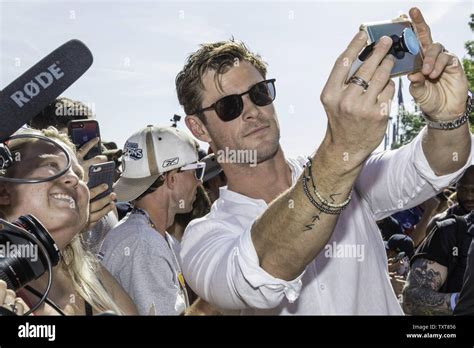 Actor Chris Hemsworth Of Thor Fame Takes A Selfie With Fans On The