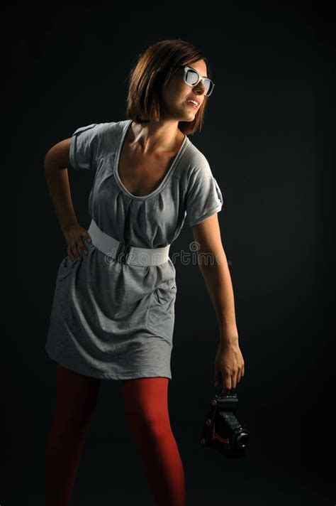 Woman with camera stock image. Image of shooting, film - 10787749