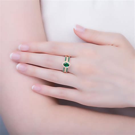 Eternity Emerald And Diamond Oval Halo 18k Yellow Gold Engagement Ring