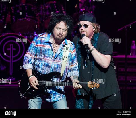 Guitarist Steve Lukather and vocalist Joseph Williams perform in ...