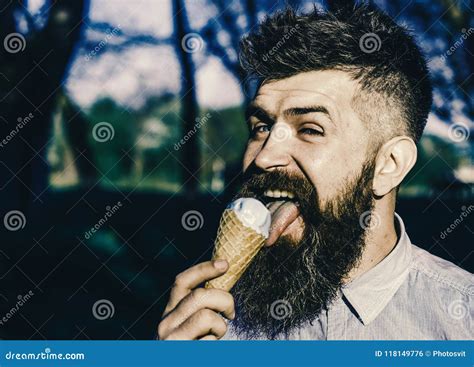 Funny Tourist Man With Long Beard Licks Ice Cream Close Up Bearded