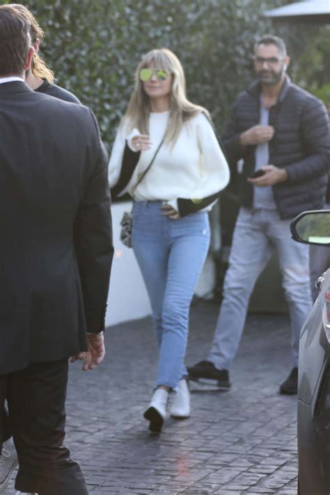 Heidi Klum In White Sweater And Jeans Gotceleb