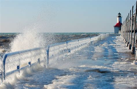 Frozen St Joseph North Pier On Lake Michigan Usa Places To See In