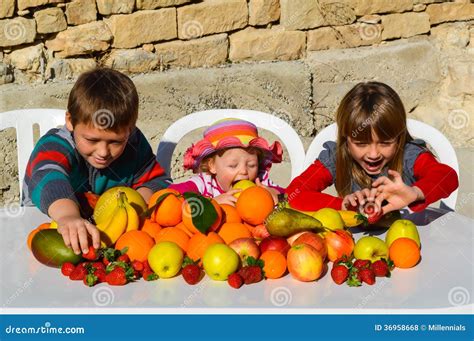 Kids eating fruits stock photo. Image of classroom, little - 36958668