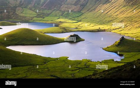 Landscape sunset view to Caldeirao crater, Corvo island, Azores ...