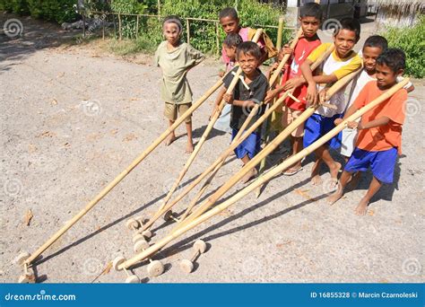 A Team of Boys with Bamboo Toys in Indonesia Editorial Stock Photo ...