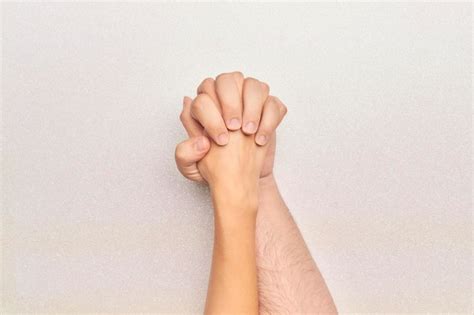 Premium Photo Man And Woman Hands Holding Each Other With Fingers