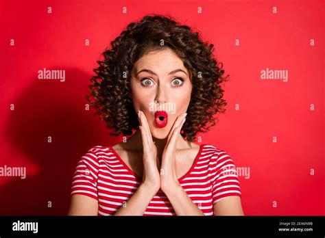 Photo Of Shocked Impressed Wavy Young Woman Dressed Striped Outfit Arms