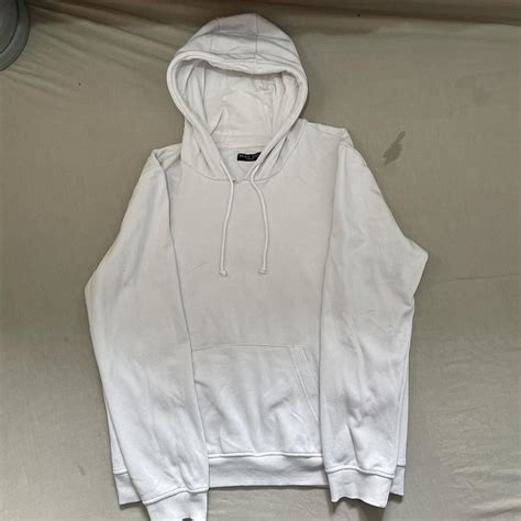 Plain white mens hoodie size medium. Slight tear at... - Depop