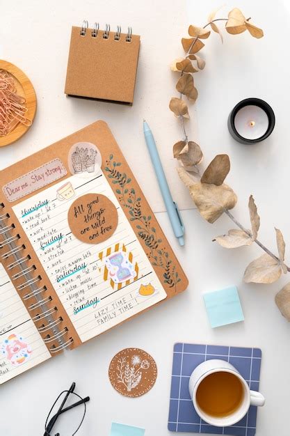 Free Photo | Paper planner bullet journal with stationery