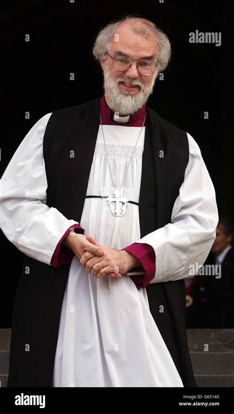 Dr Rowan Williams Stands On The Steps Outside St Paul S Cathedral In