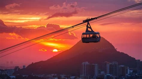 Premium Photo | Sugarloaf mountain cable car during sunset