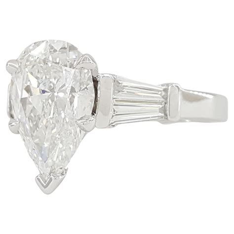 Platinum Pear Brilliant Shaped And Tapered Baguette Cut Diamond