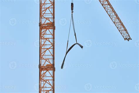 Construction crane working on building complex 12799374 Stock Photo at ...