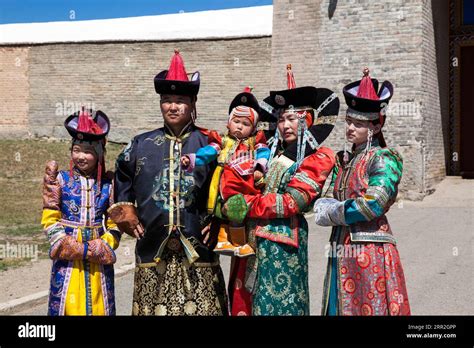 Mongolian family in traditional costume hi-res stock photography and ...