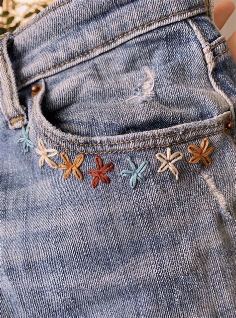 Embroidered Pair Of Jeans 🌸 Embroidery Jeans Diy Embroidered Jeans Diy Clothes Embroidery Diy