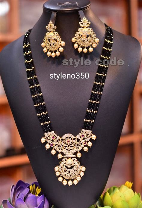 Pin By Chitra On Beeds And Pearls Black Beads Mangalsutra Design