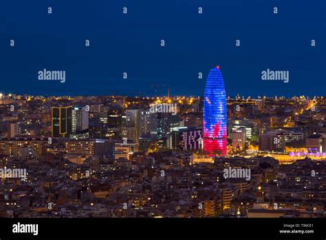 Scenic aerial view of Barcelona city skyscraper and skyline at night in ...