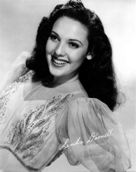 an old black and white photo of a woman