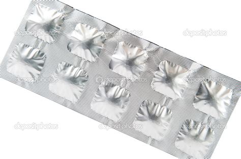 Closed Up Medicine Tablet In Aluminum Foil Strip Background Stock Photo