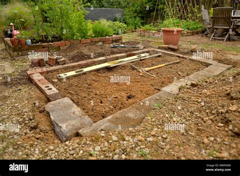 DIY Raised beds made from bricks Stock Photo - Alamy