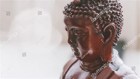 statue of Buddha in Nirvana. Symbols of Buddhism around the world ...