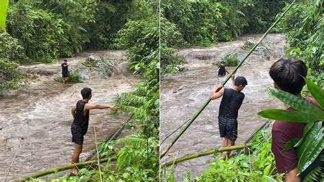 Momen Pemuda Tolong Teman Yang Terjebak Di Sungai Meluap Endingnya