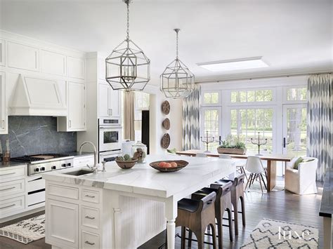 Contemporary White Kitchen with Gold Marble Island - Luxe Interiors ...