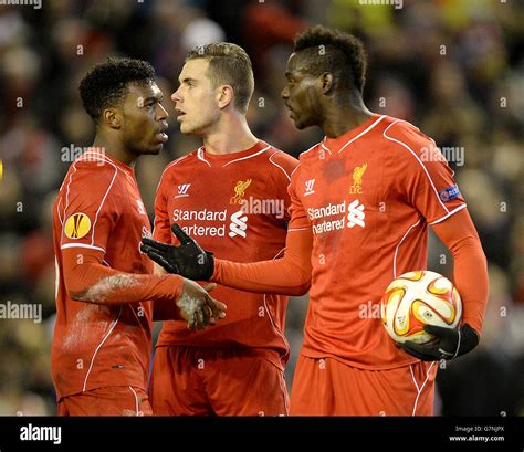 Liverpools Mario Balotelli Right Speaks With Liverpools Daniel Sturridge And Liverpools