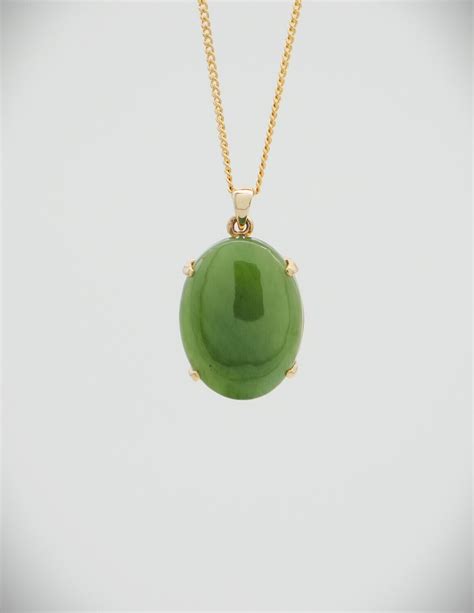 Moko Pounamu NZ Genuine Kahurangi Greenstone And 14ct Gold Pendant