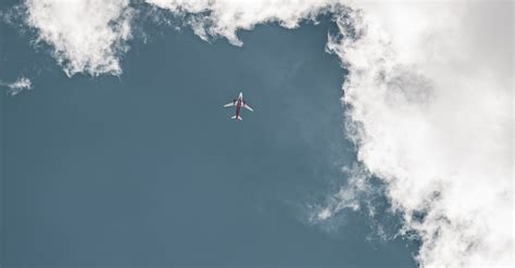 airplane flying  cloud  sky  stock photo