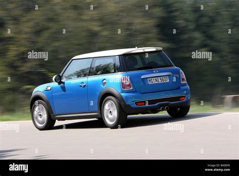 Mini Cooper S Model Year 2006 Blue Moving Diagonal From The Back