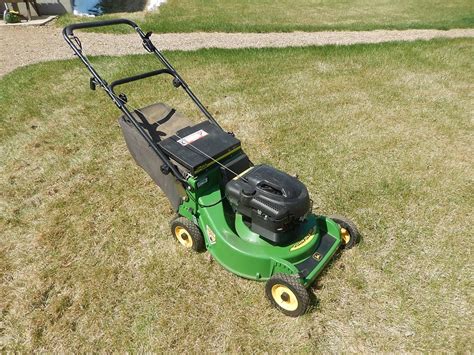 Dunkle Auction Services John Deere Ja Push Lawn Mower W Rear