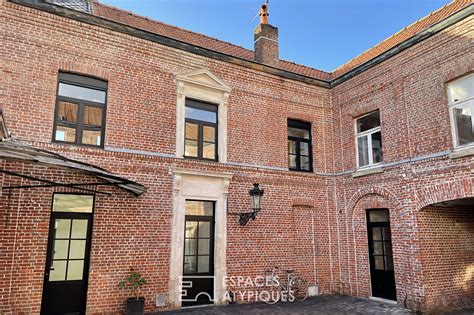 Maison de maître en briques rouges à LILLE réf 2102 Espaces