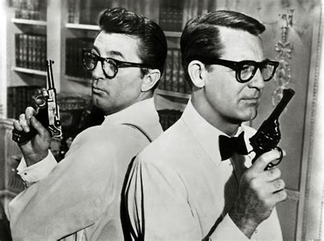 Cary Grant And Robert Mitchum Clefts Geek Glasses And Guns Wow What A… Classic Actors