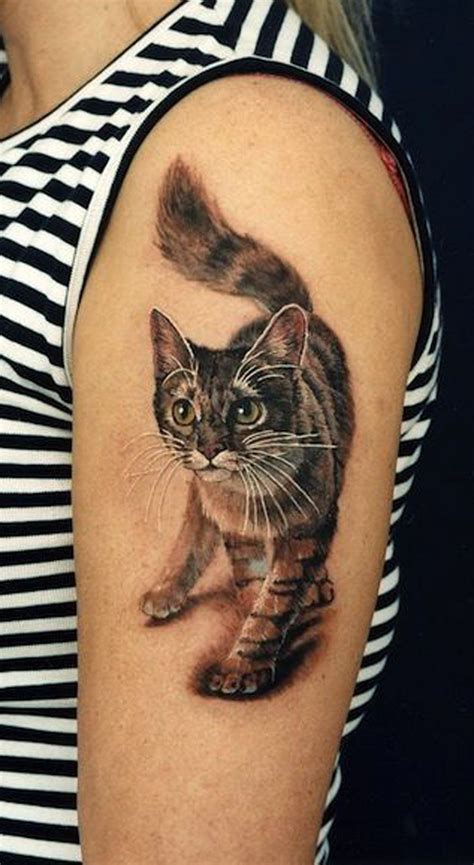 A Woman With A Cat Tattoo On Her Arm