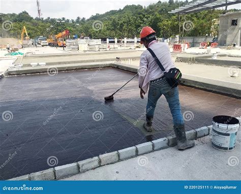 Waterproofing Membrane Applied By Construction Workers On Top Of Concrete Slab. Editorial Photo ...