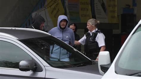 A tiny glimpse of freedom: Moment inmate being released early is RE-ARRESTED seconds later at ...