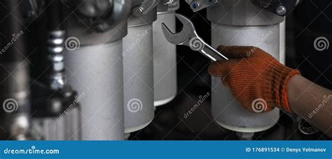 Banner With Close Up View Of Maintenance Process Of Hydraulic Pipes And