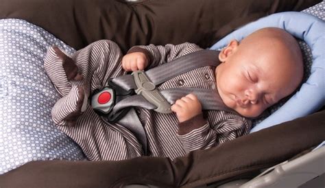 Positioning A Baby With A Newborn Car Seat Insert And Headrest