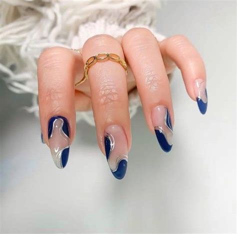Delicate Nude Nails With A Dark Blue Pattern Artofit