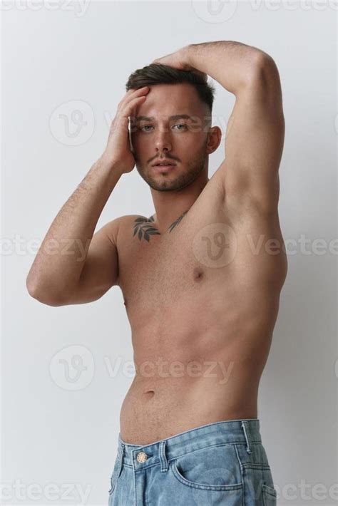 Sporty Sexy Muscular Handsome Naked Man Holds Hands On Head Posing Isolated On Over White Studio