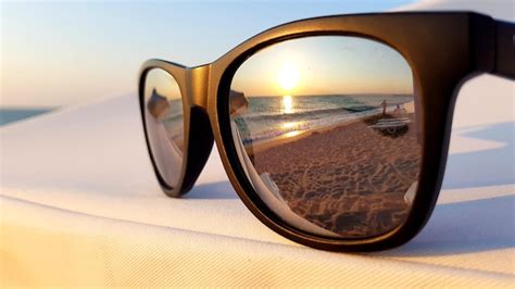 Premium Photo Close Up Of Sunglasses On Beach