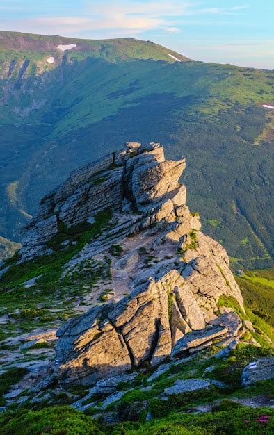 Premium Photo | Big boulder on summer mountain slope