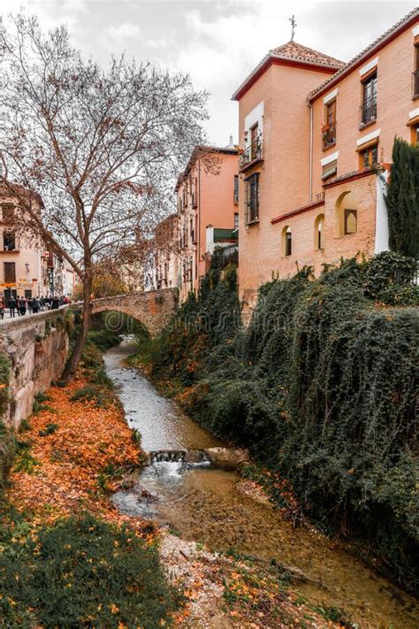 The Stone Bridge And Traditional Moorish Spanish Architecture Around